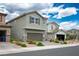 Charming two-story home featuring a two-car garage, well-kept landscaping, and a welcoming facade at 4698 Lucky Jade Ave, Las Vegas, NV 89141
