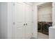 Convenient laundry area with modern washer and dryer units and ample storage space at 4698 Lucky Jade Ave, Las Vegas, NV 89141