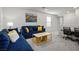 Comfortable living room featuring plush seating, modern decor, and a light-filled ambiance at 4698 Lucky Jade Ave, Las Vegas, NV 89141