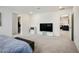 Large main bedroom featuring a television, carpet floors, and ample closet space at 4698 Lucky Jade Ave, Las Vegas, NV 89141