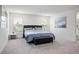 Spacious main bedroom with carpet floors, modern furnishings, and plenty of natural light at 4698 Lucky Jade Ave, Las Vegas, NV 89141