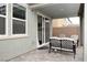 Covered patio space with outdoor seating and sliding door access to indoor living areas at 4698 Lucky Jade Ave, Las Vegas, NV 89141