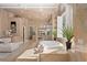 Elegant bathroom featuring a soaking tub, marble countertops, and a glass-enclosed shower at 5020 Spanish Heights Dr, Las Vegas, NV 89148