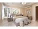 Contemporary bedroom with plush furniture, ambient lighting, and a relaxing atmosphere at 5020 Spanish Heights Dr, Las Vegas, NV 89148