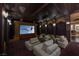 Entertainment room with comfortable seating and large projector screen for a theater experience at 5020 Spanish Heights Dr, Las Vegas, NV 89148