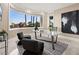 Bright office featuring large windows with scenic views, modern decor, and neutral tones at 5020 Spanish Heights Dr, Las Vegas, NV 89148