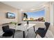 Bright office featuring large windows with scenic views, modern decor, and neutral tones at 5020 Spanish Heights Dr, Las Vegas, NV 89148