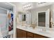 Bathroom featuring a double sink vanity and shower/tub combo at 5144 Poem Ct, North Las Vegas, NV 89081