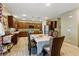 This open-concept dining area offers a seamless transition to the modern kitchen with ample counter space at 5144 Poem Ct, North Las Vegas, NV 89081