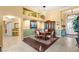 Spacious dining room with stylish decor and a view of the front entryway at 5940 Vizzi Ct, Las Vegas, NV 89131