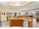 Well-lit kitchen with granite countertops, stainless steel dishwasher and ample cabinet space at 5940 Vizzi Ct, Las Vegas, NV 89131