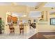 Open-concept design connects kitchen, dining, and living spaces, perfect for entertaining and Gathering at 5940 Vizzi Ct, Las Vegas, NV 89131