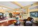 Open-concept area showcasing the flow between the living area, kitchen, and dining space at 5940 Vizzi Ct, Las Vegas, NV 89131