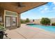 Back patio with refreshing pool, hot tub, and covered area at 5940 Vizzi Ct, Las Vegas, NV 89131