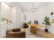 Home office featuring a wood desk, tile accent wall, and natural light at 800 Jody Brook Ct, Las Vegas, NV 89145