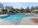 Resort-style pool with plenty of room for recreation plus tables and chairs for relaxing by the poolside at 800 Jody Brook Ct, Las Vegas, NV 89145