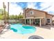 Enjoy outdoor living with a private pool and spa, along with a covered patio area at 94 Fantasia Ln, Henderson, NV 89074