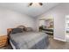 Bedroom with a large bed, side tables, and mirrored closet doors at 94 Fantasia Ln, Henderson, NV 89074