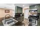 Spacious kitchen with stainless steel appliances, granite countertops, and ample cabinet space at 94 Fantasia Ln, Henderson, NV 89074