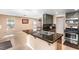 Kitchen features granite countertops, stainless appliances, and tile flooring at 94 Fantasia Ln, Henderson, NV 89074