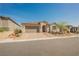 Desirable single-story home with a well-kept lawn and a convenient two-car garage at 10126 Cliff Dwellings Ave, Las Vegas, NV 89178