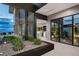 Modern home featuring a zen-like courtyard with desert plants at 12 Chisel Crest Ct, Henderson, NV 89012