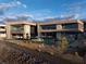 Stunning modern architecture with seamless indoor/outdoor living spaces and desert landscaping at 12 Chisel Crest Ct, Henderson, NV 89012