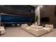 Stunning living room with large glass doors offers city views and flows into the outdoor space at 12 Chisel Crest Ct, Henderson, NV 89012