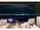 Elegant living room with luxurious seating, offering spectacular views of the Las Vegas Strip at 12 Chisel Crest Ct, Henderson, NV 89012