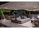The expansive open layout includes a pool table, bar area, and comfortable seating with stunning city views at 12 Chisel Crest Ct, Henderson, NV 89012