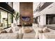 Bright living room with fireplace, modern furnishings, and an open layout at 12 Chisel Crest Ct, Henderson, NV 89012