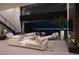 Expansive living area showcasing modern furnishings, fireplace, and city views at 12 Chisel Crest Ct, Henderson, NV 89012