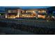 Contemporary home boasts an open-concept design, seamlessly blending indoor/outdoor living with a yard with a pool at 12 Chisel Crest Ct, Henderson, NV 89012