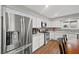 Bright kitchen featuring stainless steel appliances, white cabinets, and modern countertops at 1619 Abby Ave, Henderson, NV 89014