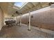 Covered patio area with ceiling fans, outdoor seating, and tile flooring at 1619 Abby Ave, Henderson, NV 89014