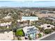 Aerial view of home on Purple Majesty Ct. featuring a pool, solar panels and a view of the Las Vegas strip at 2209 Purple Majesty Ct, Las Vegas, NV 89117