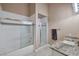 Bathroom featuring a shower, bathtub, neutral tile, and granite countertop vanity at 2209 Purple Majesty Ct, Las Vegas, NV 89117