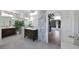 Spacious bathroom featuring double vanities, tile floors and an entry to another room at 2209 Purple Majesty Ct, Las Vegas, NV 89117
