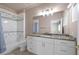 Charming bathroom with shower-tub combo, granite counters, and neutral paint at 2209 Purple Majesty Ct, Las Vegas, NV 89117