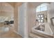 View of the home's foyer featuring marble floors and a double door entry with high ceilings at 2209 Purple Majesty Ct, Las Vegas, NV 89117