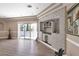 Large game room showcasing wood floors and a built in bar at 2209 Purple Majesty Ct, Las Vegas, NV 89117
