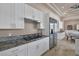 Stylish kitchen features stainless steel appliances and ample counter space at 2209 Purple Majesty Ct, Las Vegas, NV 89117