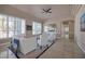 Spacious living room with recessed lighting, neutral tones, fireplace, and plantation shutters at 2209 Purple Majesty Ct, Las Vegas, NV 89117