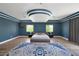 Main bedroom showcasing a decorative tray ceiling and ample natural light at 2209 Purple Majesty Ct, Las Vegas, NV 89117