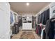 Walk-in closet featuring custom shelving and hanging storage at 2209 Purple Majesty Ct, Las Vegas, NV 89117