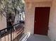 Private patio featuring a metal fence and door at 3275 Arville St # C, Las Vegas, NV 89102