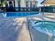 Community swimming pool with a spa and ample sunbathing space at 3275 Arville St # C, Las Vegas, NV 89102