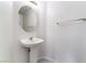 Clean half bathroom featuring a pedestal sink and modern fixtures at 4176 Skywalker Ave, Las Vegas, NV 89120