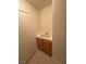 Functional bathroom sink with tile countertop and storage cabinet, providing a convenient space for daily routines at 4176 Skywalker Ave, Las Vegas, NV 89120