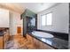 Primary bath with separate tub and shower and marble countertops at 4176 Skywalker Ave, Las Vegas, NV 89120